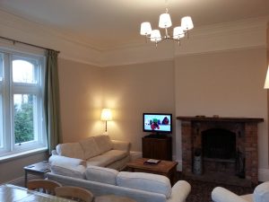 Balmoral's living room without the pine cladding
