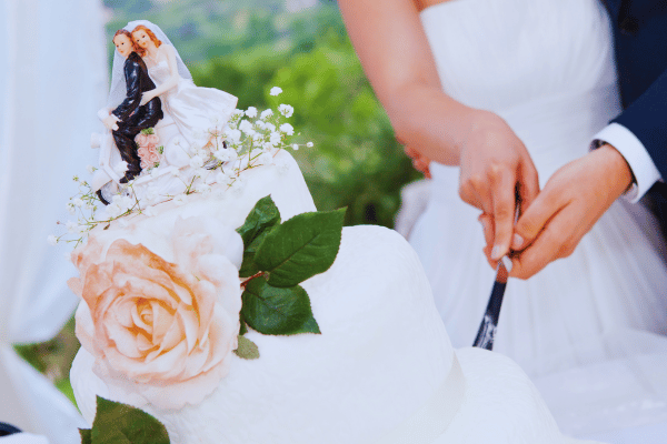 cutting a wedding cake