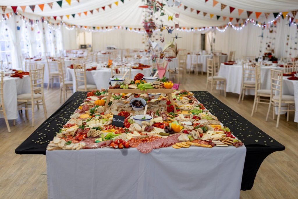 A delicious grazing table display filled with fresh wedding catering options at Hargate Hall peak district wedding venues.
