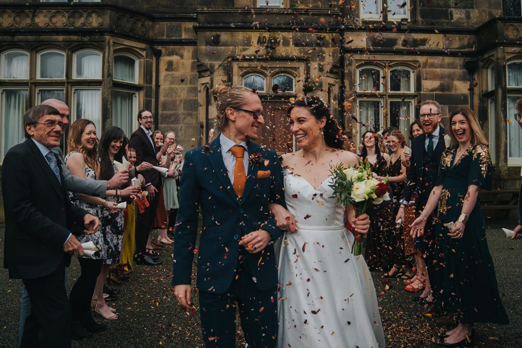 confetti toss for newly married couple at Hargate Hall