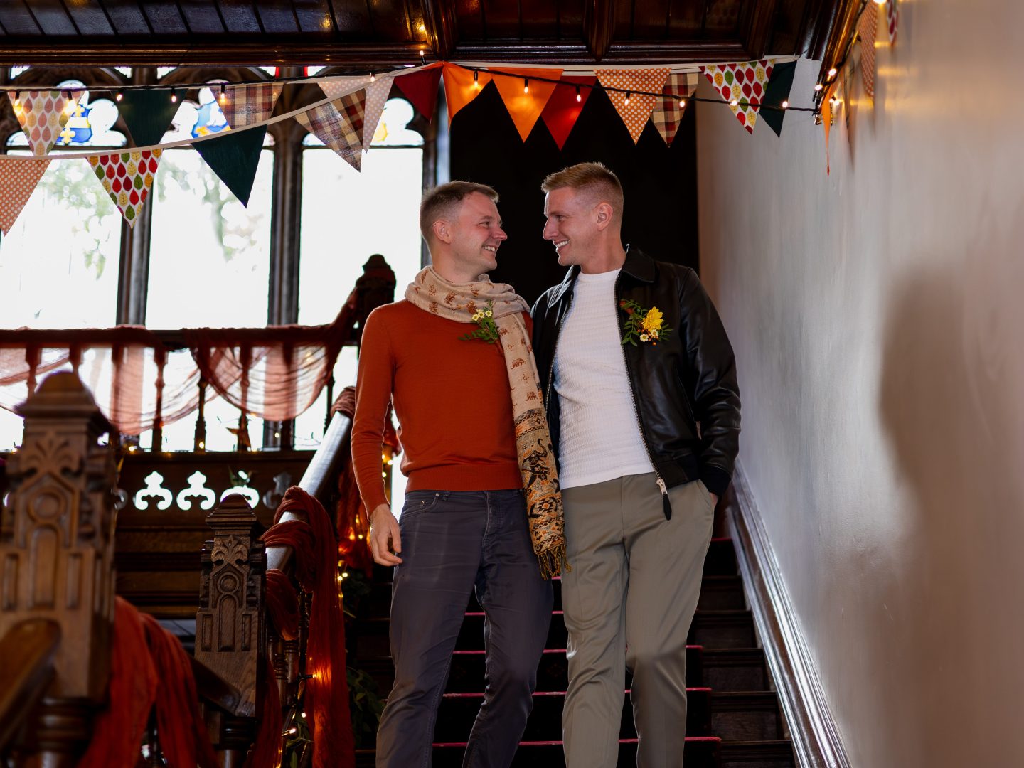 gay couple making their entrance to their wedding ceremony